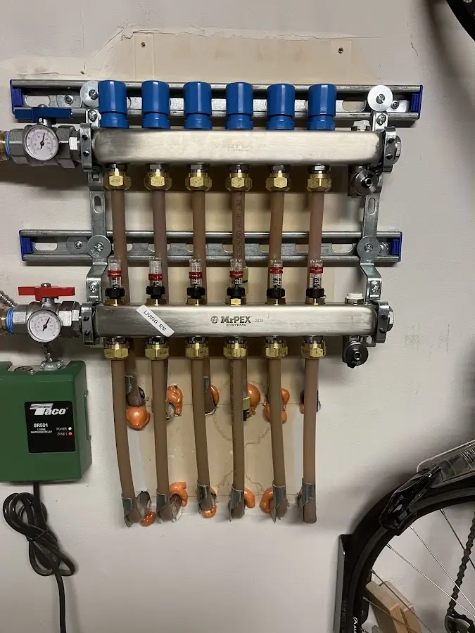 Plumber performing Water Heater Repair at a residential property in Marlton